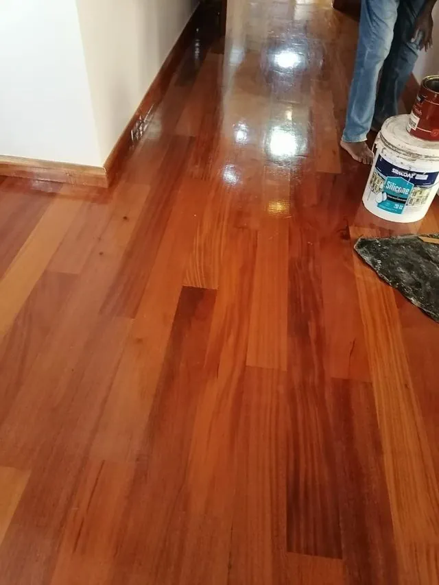Wooden floor being sanded and sealed